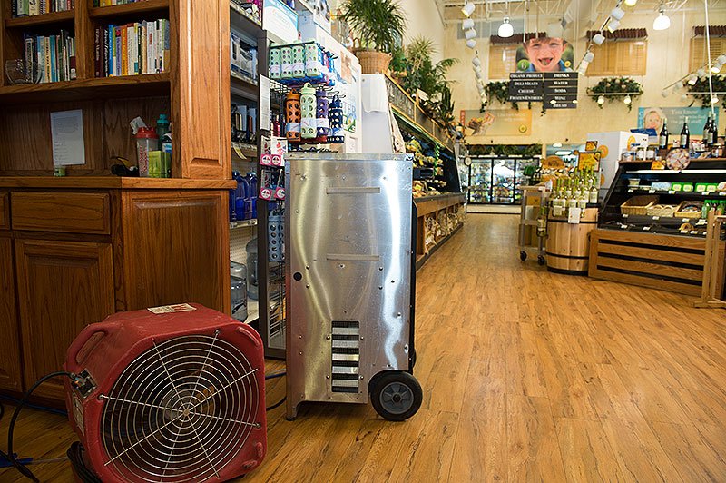 Water Damage Clean Up Fans Drying Out Grochery Store